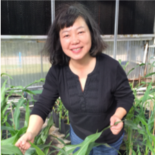 Photo of Fang Bai in greenhouse 